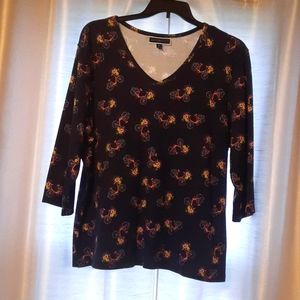 Gently worn Karen Scott navy blue bicycle print jersey with 3/4 length sleeves.